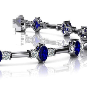 Two Tone Diamond And Oval Shaped Gemstone Bracelet Available In Gold Or Platinum